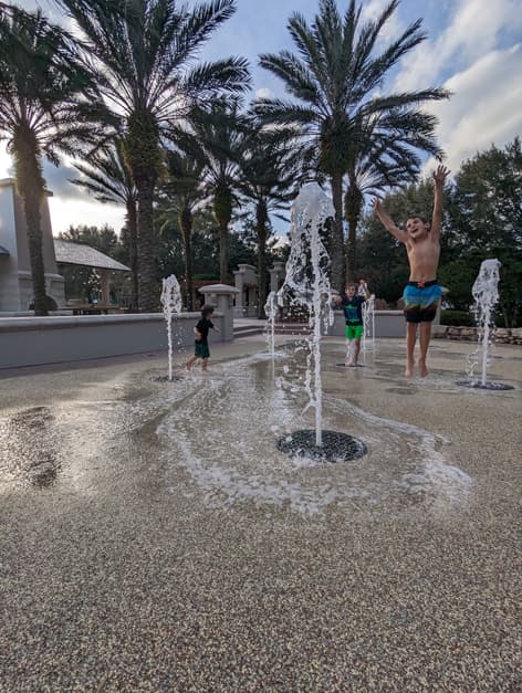 Kids jumping and playing on Softroc splash pad rubber surfacing